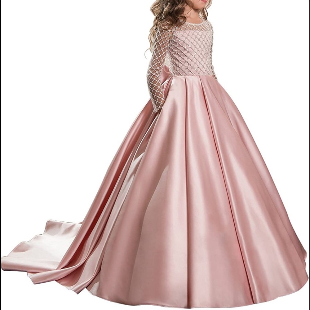 Girls pink dress. Size 10 long dress for girls with bow and tail in the back.